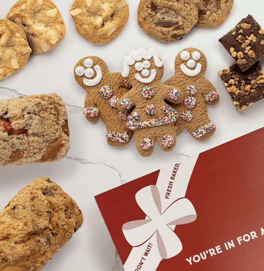Custom gift box cookies assortment and fresh baked loaf breads.