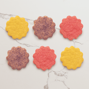 Multi-colored sugar cookies to build your box. 