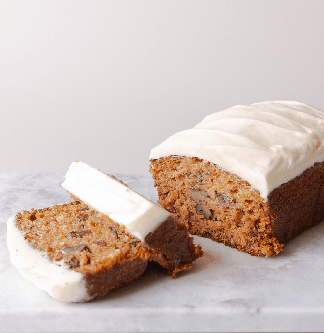 Sliced fresh baked muffin loaf with icing