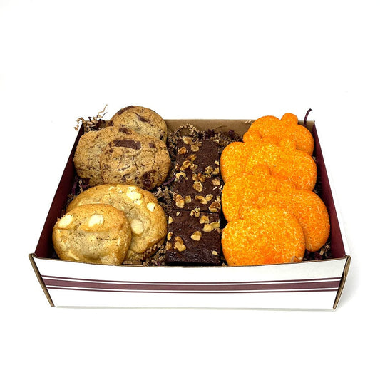 Dessert sampler containing a sample of chocolate brownies and sugar cookies from Gingerbread Construction Co. 