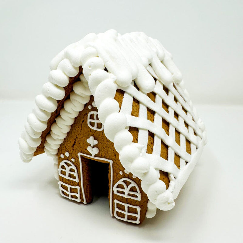 White Icing Gingerbread House The Gingerbread Construction Co. 