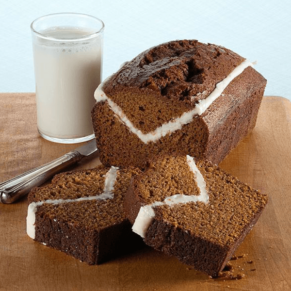 Gingerbread muffin loaf with cream cheese icing.