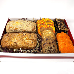 A delux collection gift box filled with a variety of Gingerbread Construction Co. best treats.