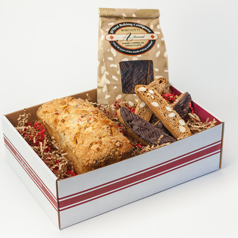 Muffin loaf and biscotti gift box containing a variety muffin loaf and a chocolate biscotti